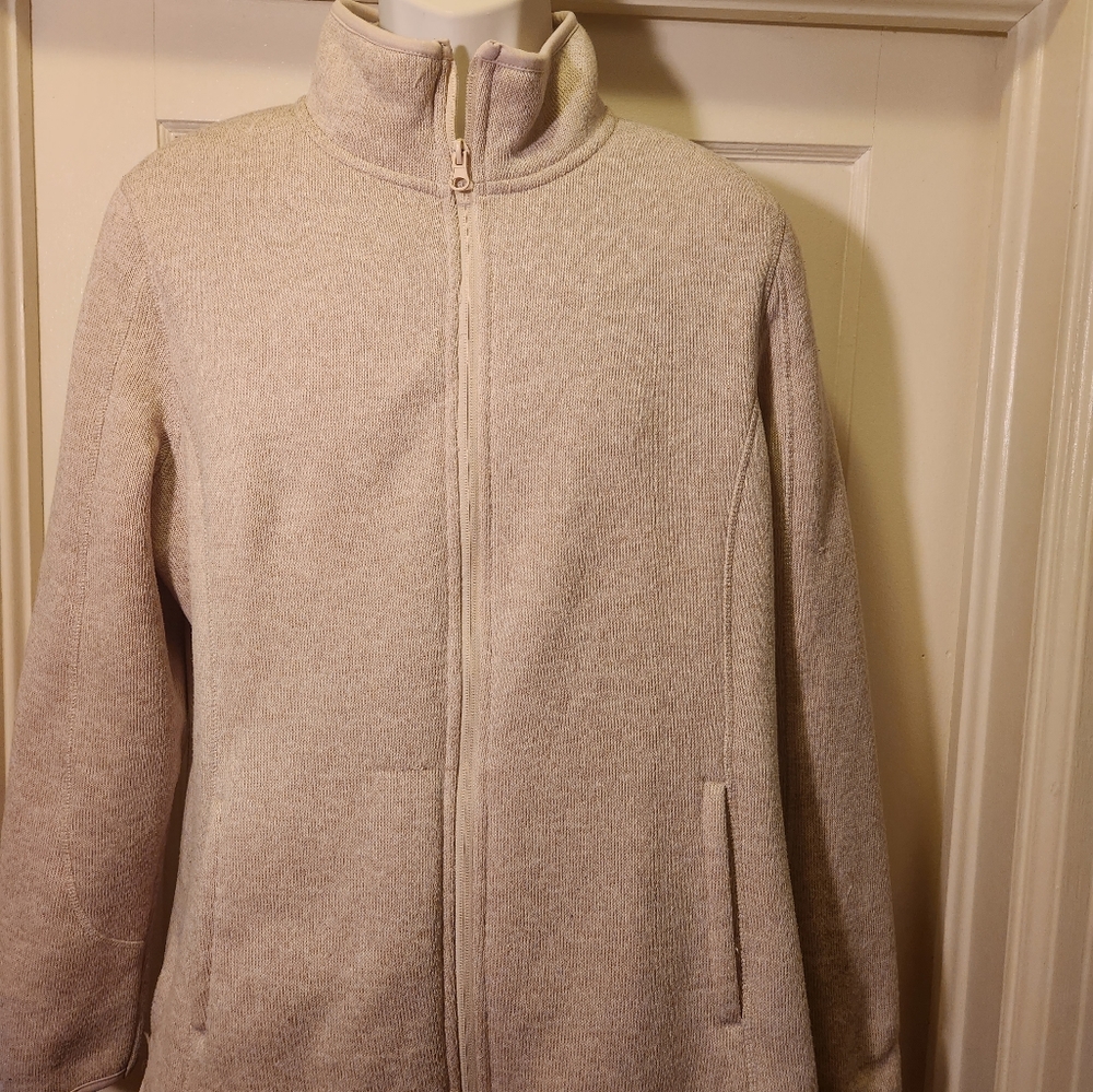 Womens jacket. Fur lined. Cream color